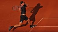 Tsitsipas hits a forehand at the 2023 Barcelona Open.
